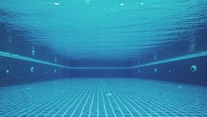Swimming pool drowning detection system
