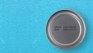 Paint can on blue background
