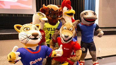 School mascots unite at Universidad La Salle’s National Sports Games.